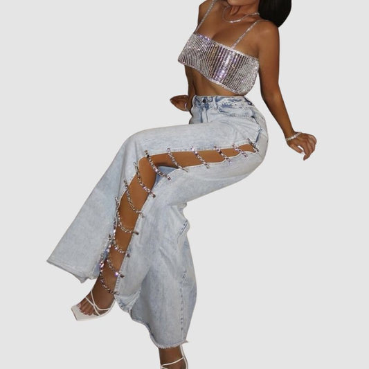 Vaqueros calados con adornos de cadena