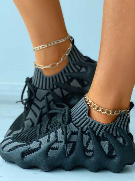 Zapatillas deportivas transpirables de punto con cordones elásticos