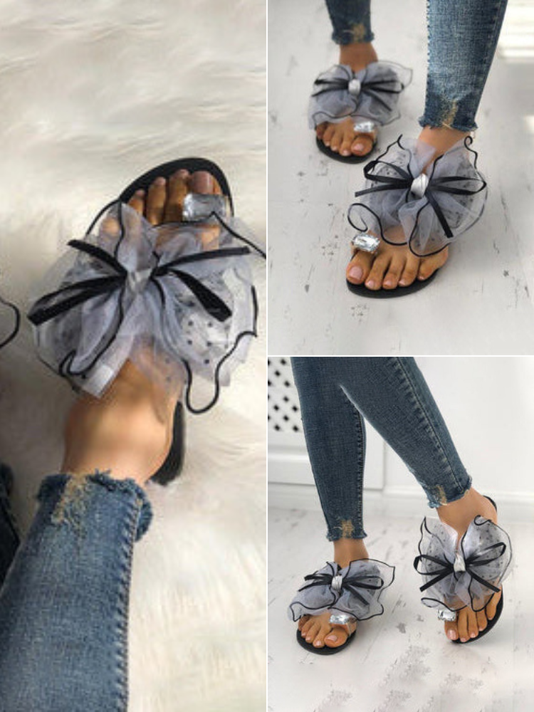 Pantuflas planas con lazo y diamantes de imitación