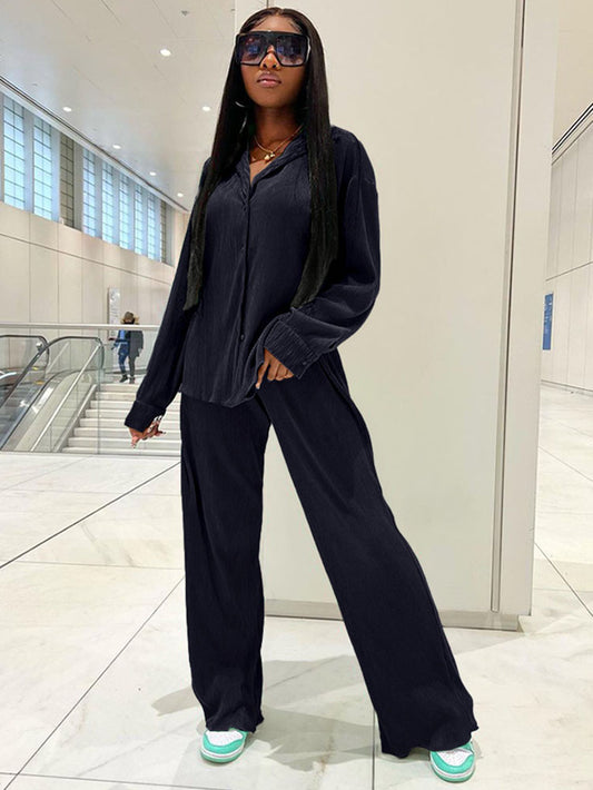 Dos piezas plisadas de manga larga y pantalones largos