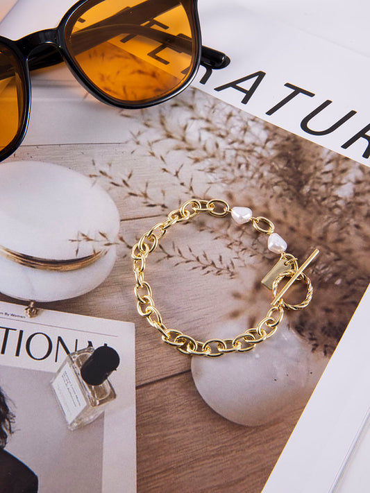 Pulsera con dije de cadena