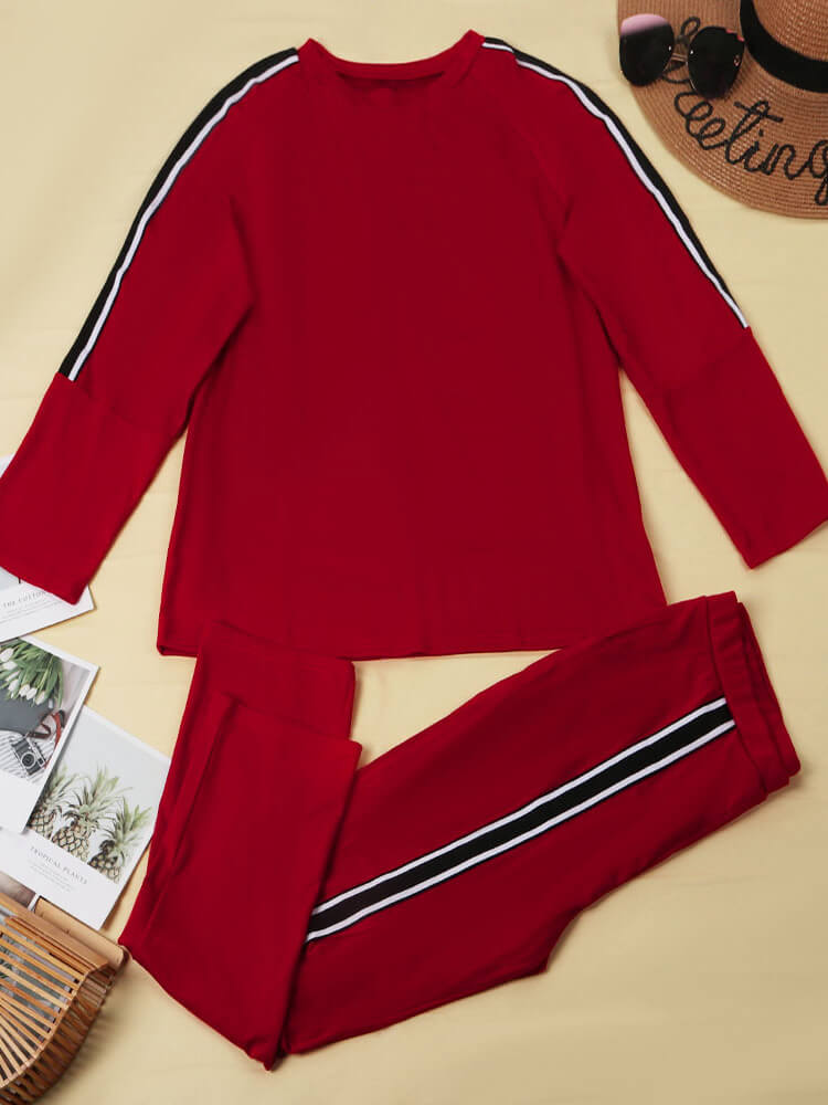 Conjuntos de pantalones y tops de manga larga a rayas de dos piezas de talla grande