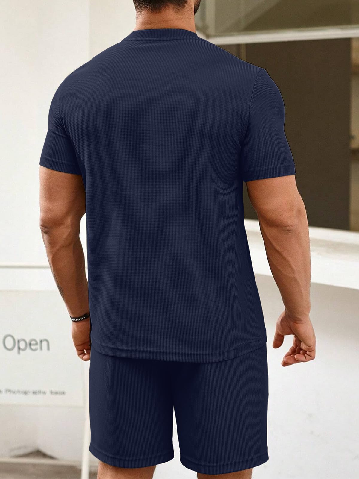 Conjunto de pantalones cortos y top tipo gofre de dos piezas para hombre