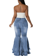 Jeans acampanados de mezclilla con cintura alta y volantes