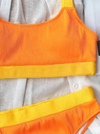 Camisetas sin mangas de dos piezas y trajes de baño breves