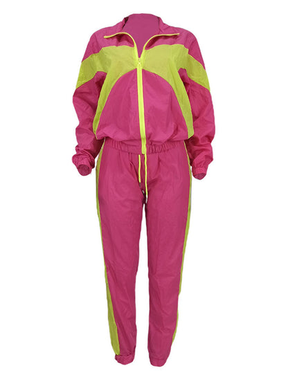 Tops con cremallera y pantalones largos con bloques de color de dos piezas