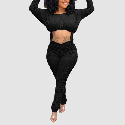 Conjunto de top corto con cordón y pantalón plisado