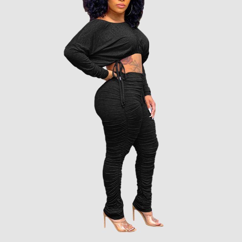 Conjunto de top corto con cordón y pantalón plisado