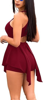 Mono irregular sin mangas con cremallera y cuello halter
