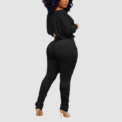 Conjunto de top corto con cordón y pantalón plisado