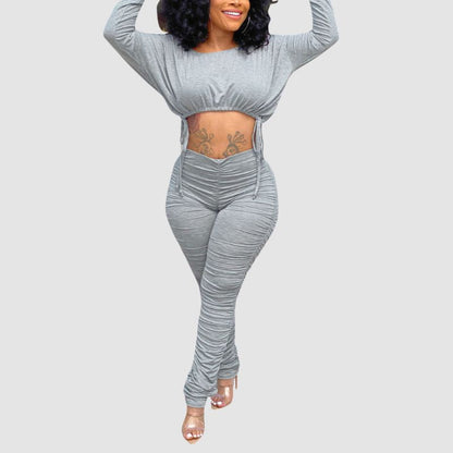 Conjunto de top corto con cordón y pantalón plisado