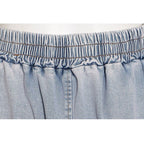Conjunto de pantalón largo y top corto sin tirantes de mezclilla