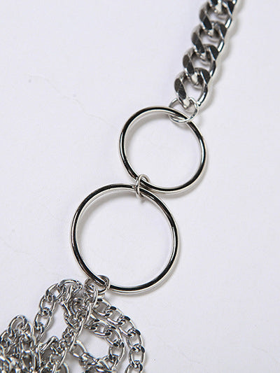 Top corto con cadena metálica y espalda descubierta 