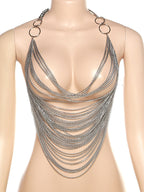 Top corto con cadena metálica y espalda descubierta 