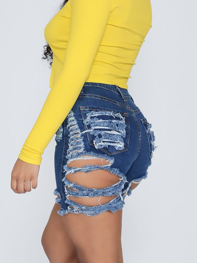 Shorts vaqueros desgastados hasta la rodilla con roturas elásticas 