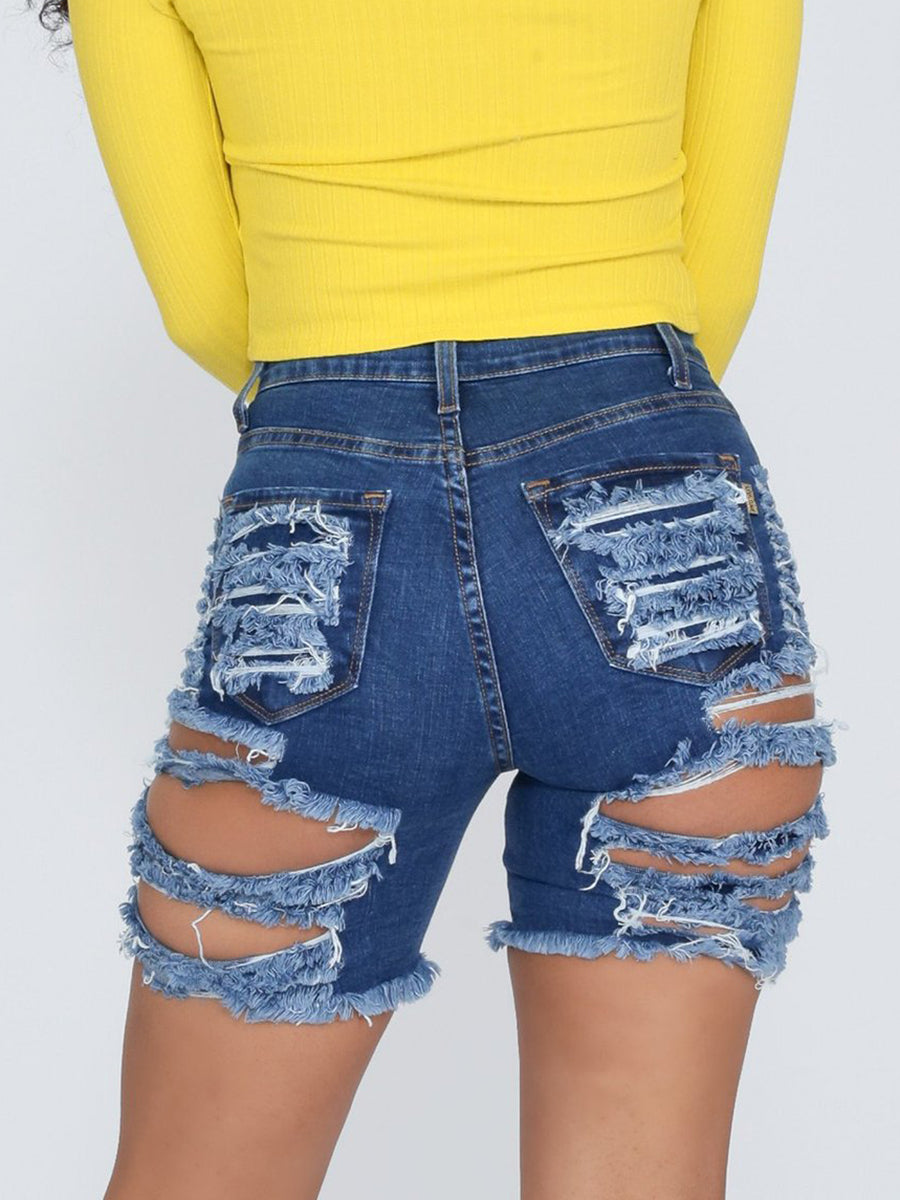 Shorts vaqueros desgastados hasta la rodilla con roturas elásticas 