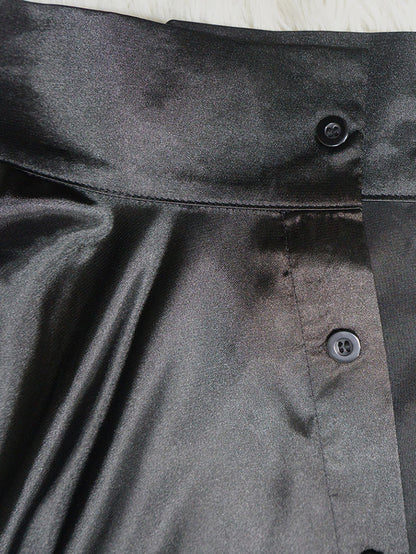 Blusa sedosa con botones y manga de murciélago holgada irregular 