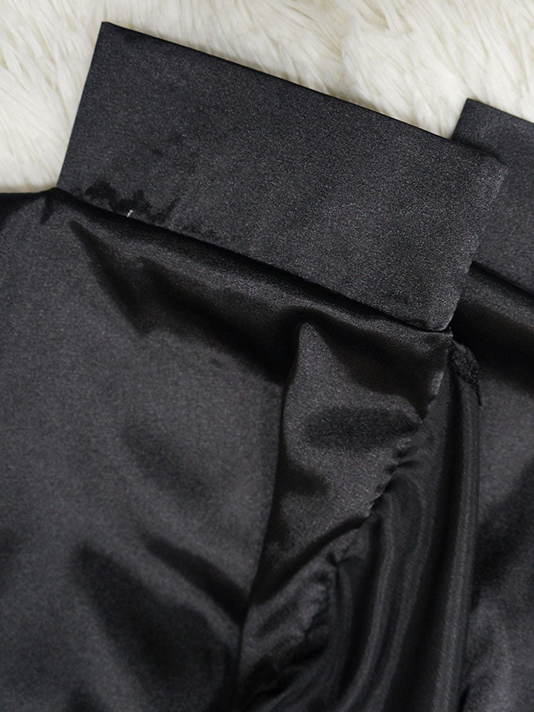 Blusa sedosa con botones y manga de murciélago holgada irregular 