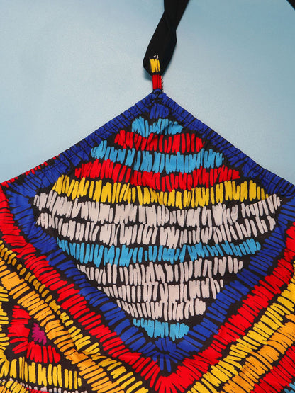 Vestido largo sin espalda con cuello halter y estampado colorido 