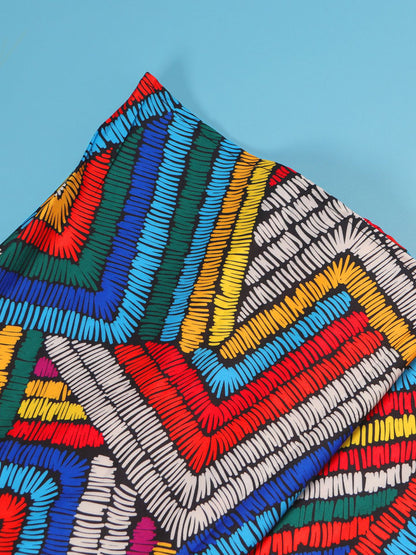 Vestido largo sin espalda con cuello halter y estampado colorido 