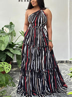 Vestido largo sin espalda a rayas con un solo hombro 