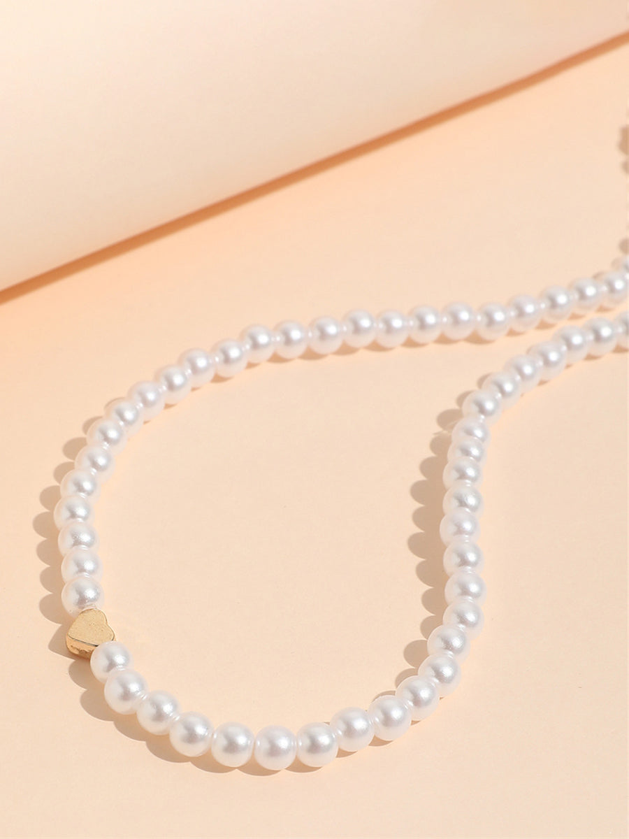 Collar con colgante de corazón de perlas 