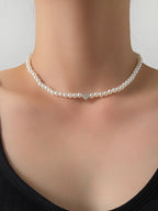 Collar con colgante de corazón de perlas 