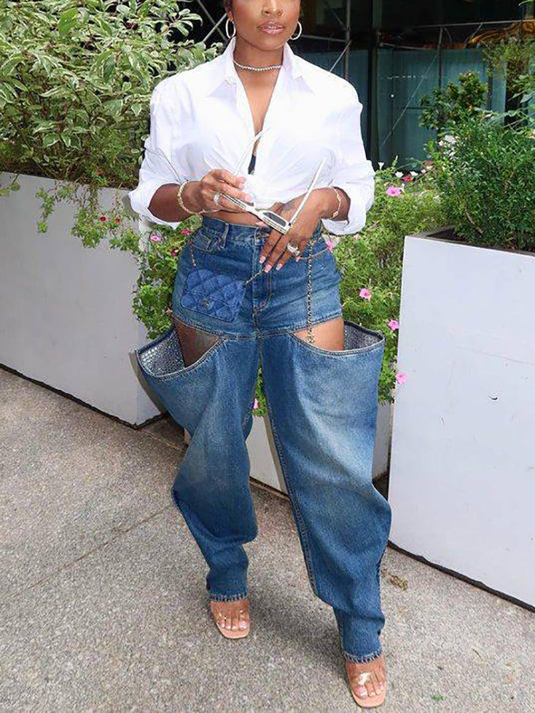 Vaqueros de mezclilla elásticos desgastados con agujeros 