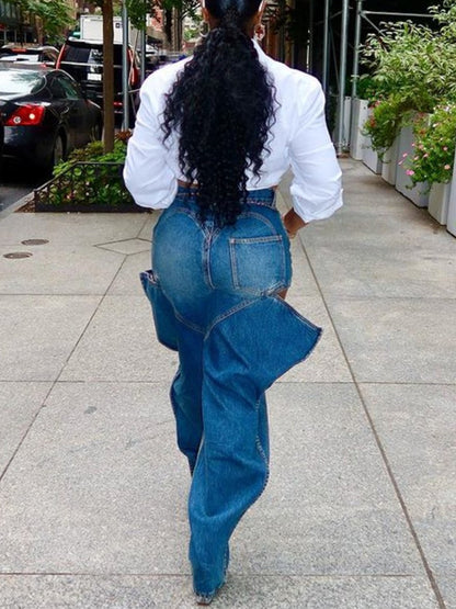 Vaqueros de mezclilla elásticos desgastados con agujeros 