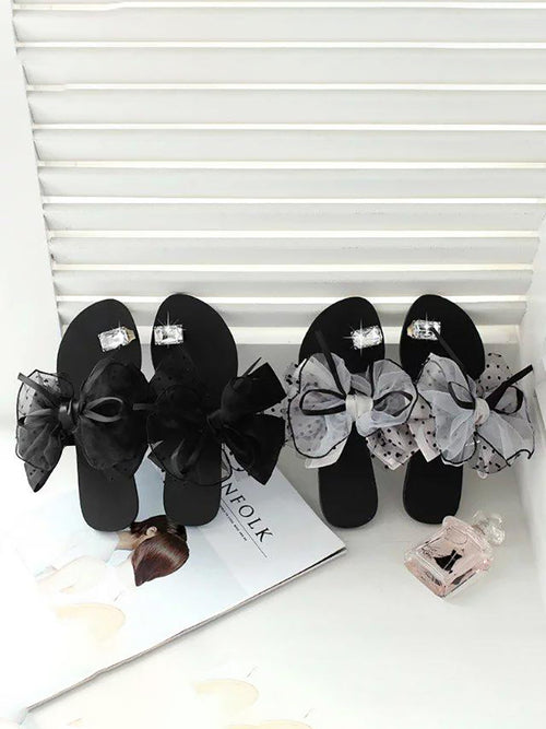 Pantuflas planas con lazo y diamantes de imitación 
