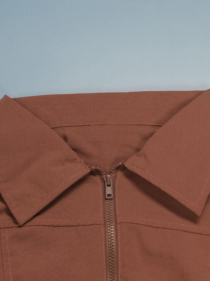 Monos de pierna ancha con bolsillo con cremallera y manga corta 