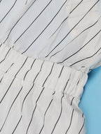 Vestido acampanado sin espalda con tiras cruzadas a rayas 