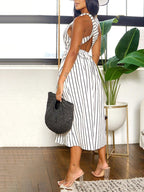 Vestido acampanado sin espalda con tiras cruzadas a rayas 