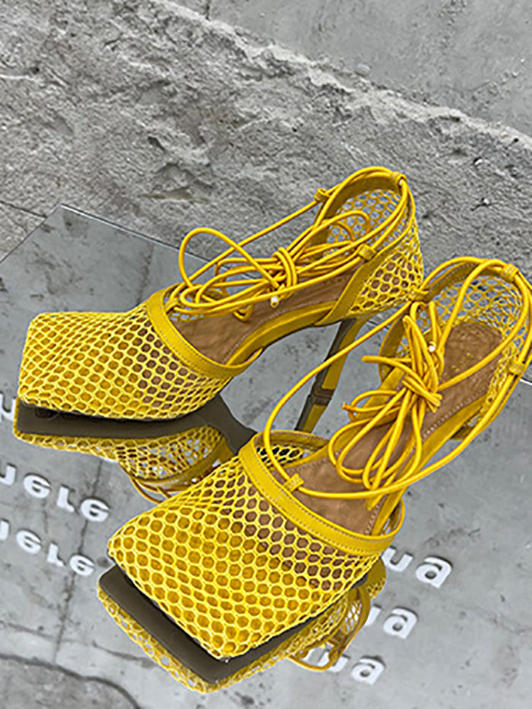 Sandalias de tacón alto con tiras cruzadas ahuecadas 