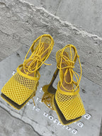 Sandalias de tacón alto con tiras cruzadas ahuecadas 