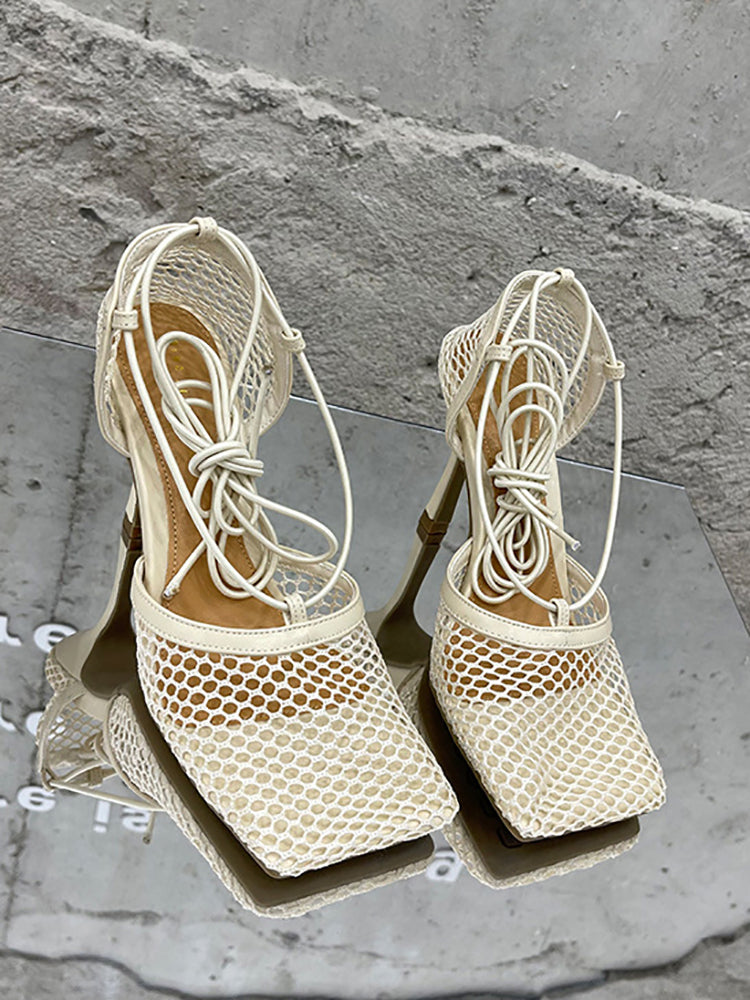 Sandalias de tacón alto con tiras cruzadas ahuecadas 
