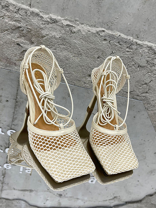 Sandalias de tacón alto con tiras cruzadas ahuecadas 