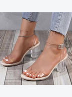Tacones con puntera abierta y tiras transparentes de bloque grueso