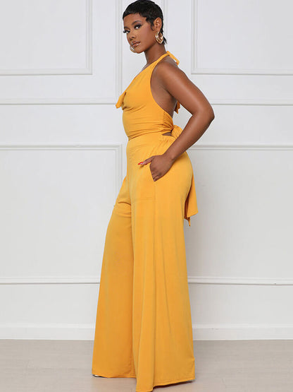 Monos de pierna ancha con cordones y espalda descubierta con cuello halter