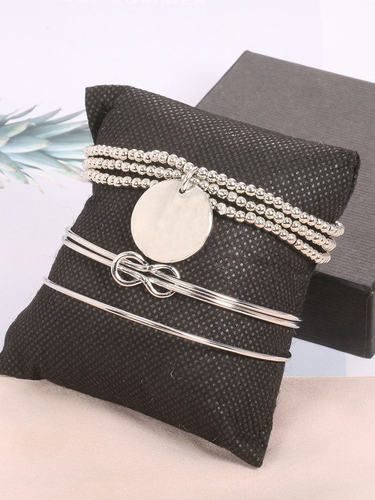 Pulsera minimalista con cuentas anudadas