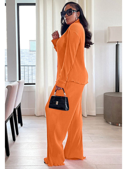 Dos piezas plisadas de manga larga y pantalones largos