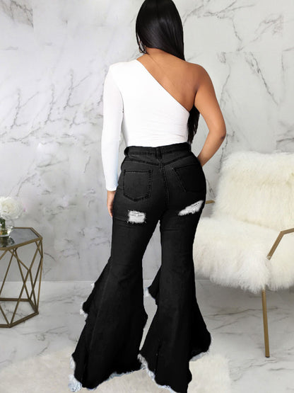 Jeans largos de mezclilla con dobladillo con volantes rasgados