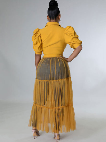 Tops con cuello en V y manga corta con patchwork de malla