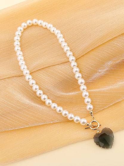 Collar con colgante de corazón de perlas