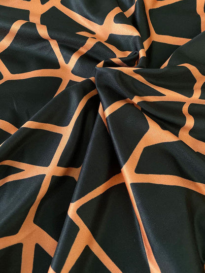 Mono estampado de dos piezas con hombros descubiertos + pantalones ajustados