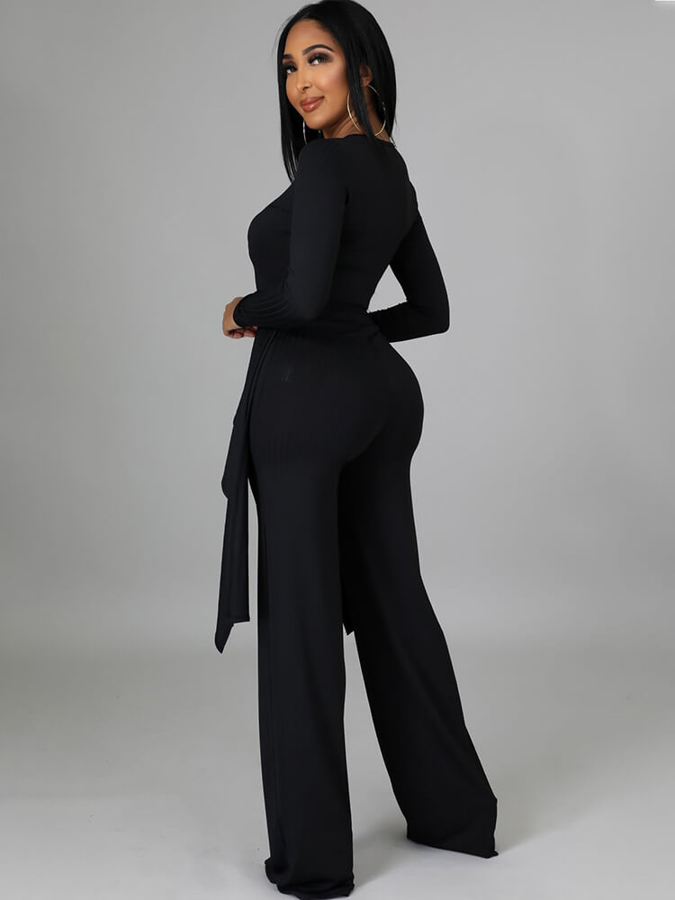 Top con cuello en V y pantalones largos con cordones irregulares de dos piezas