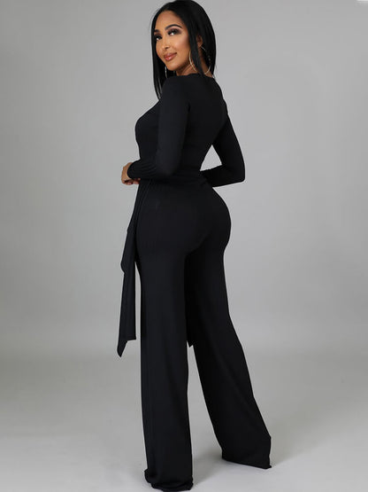 Top con cuello en V y pantalones largos con cordones irregulares de dos piezas