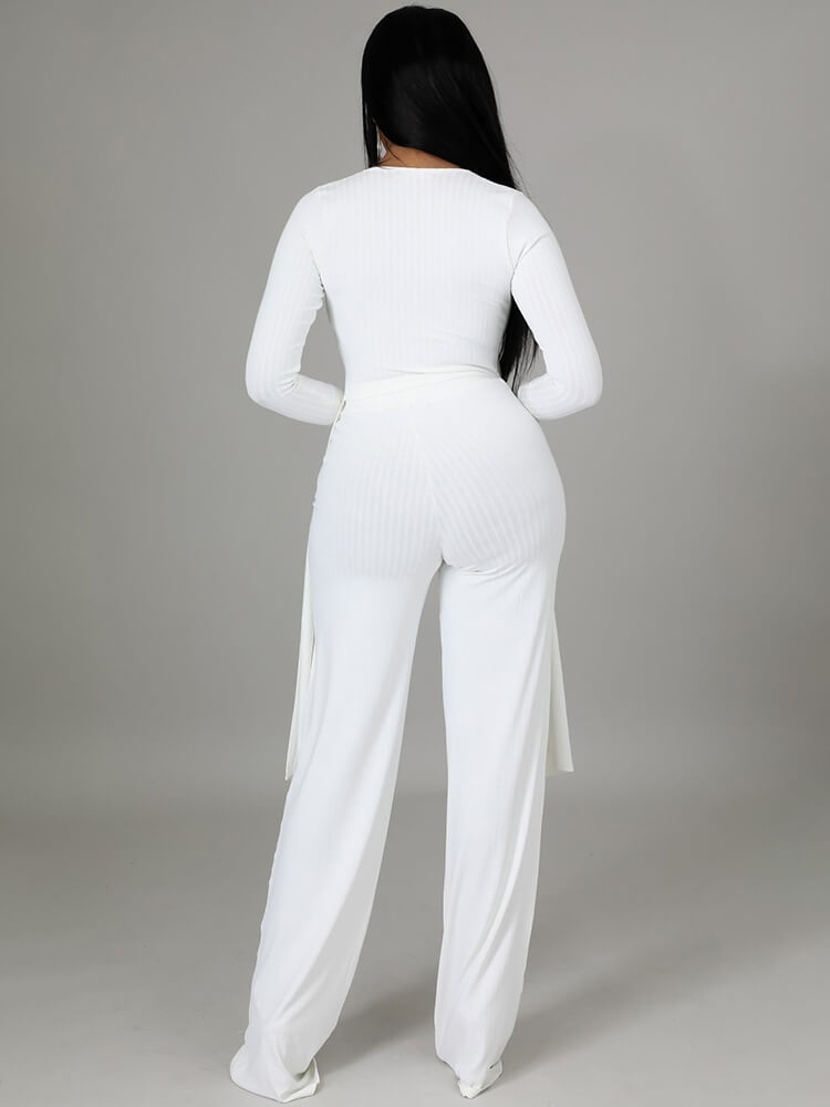 Top con cuello en V y pantalones largos con cordones irregulares de dos piezas