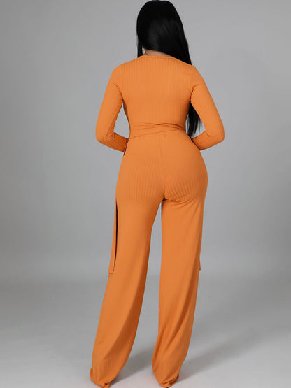 Top con cuello en V y pantalones largos con cordones irregulares de dos piezas