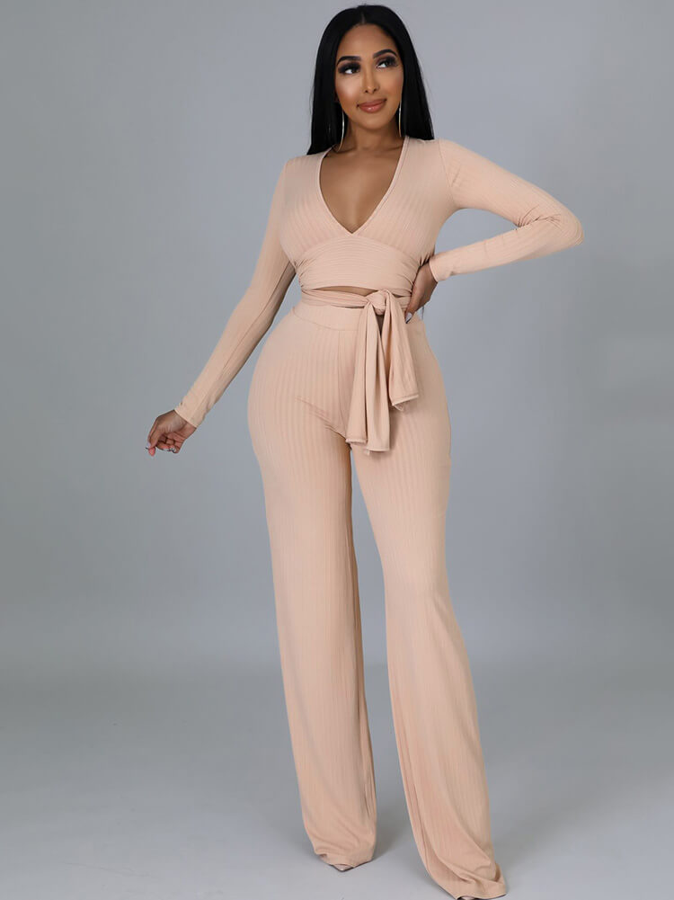 Top con cuello en V y pantalones largos con cordones irregulares de dos piezas